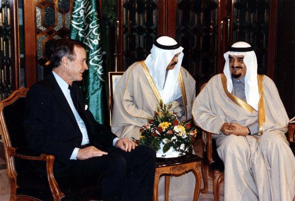 President George H. W. Bush meets with Saudi Arabian King Fahd in Riyadh, Saudi Arabia.